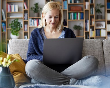 Blonde woman on laptop